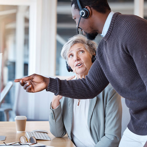 call center black man and coach training employee
